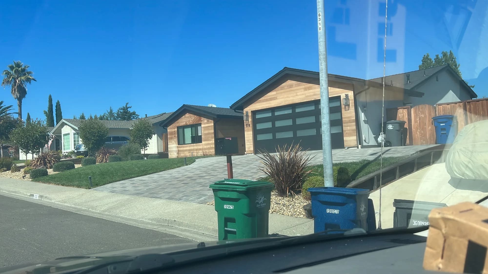 Dark grey garage door on a house exterior