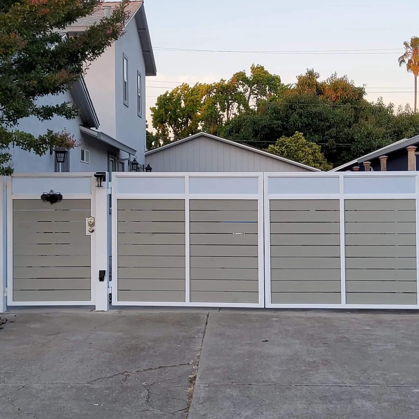 Modern horizontal slat driveway gate