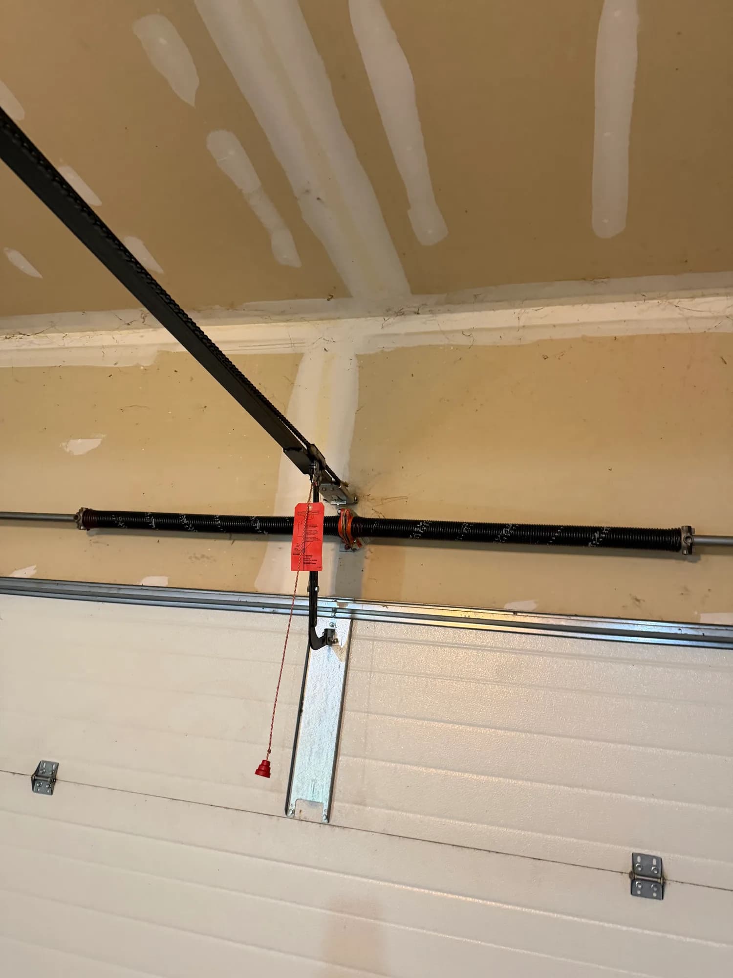 Garage door emergency release cord after a stuck-open call