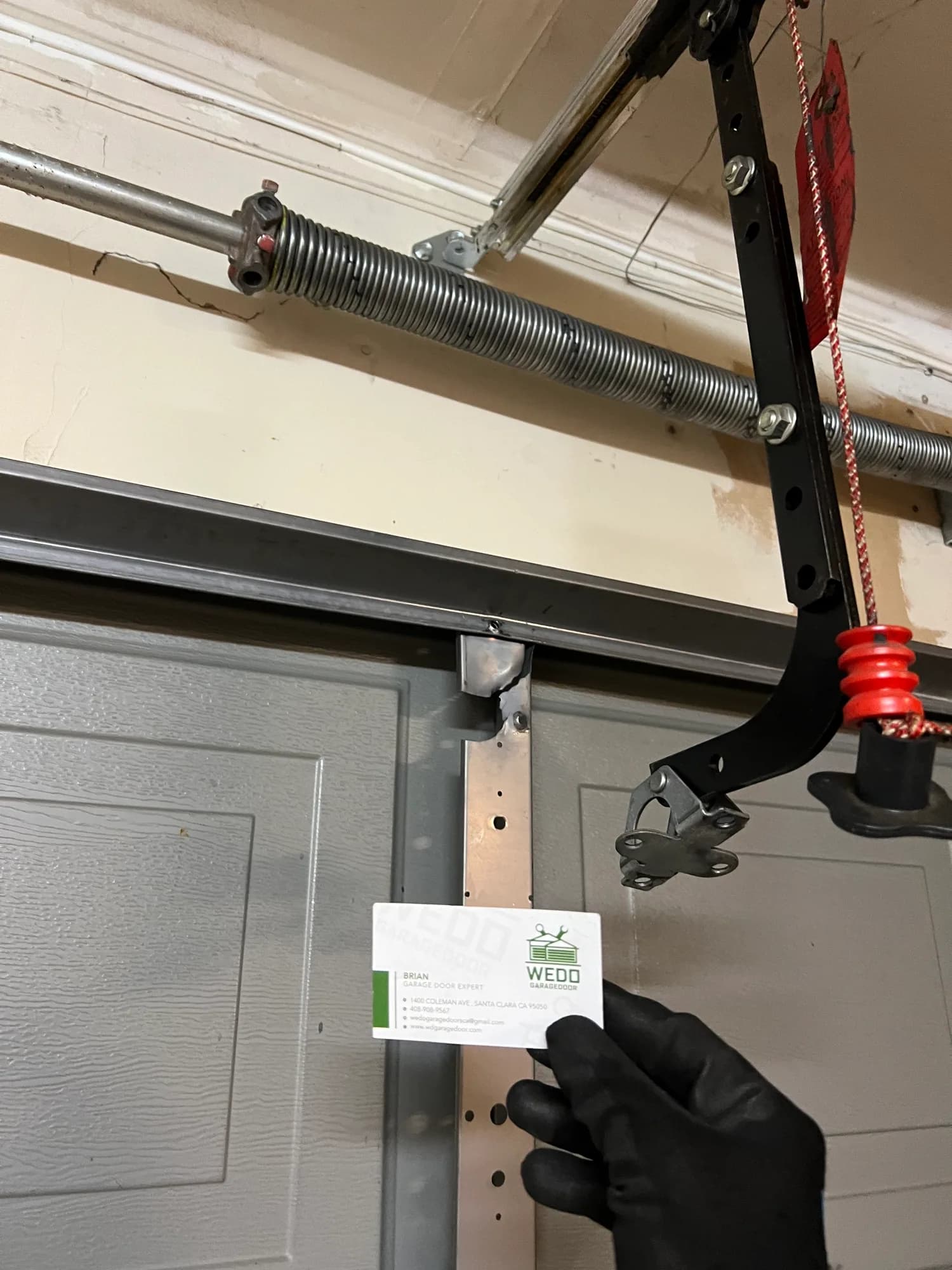 Garage door opener rail during an on-site inspection