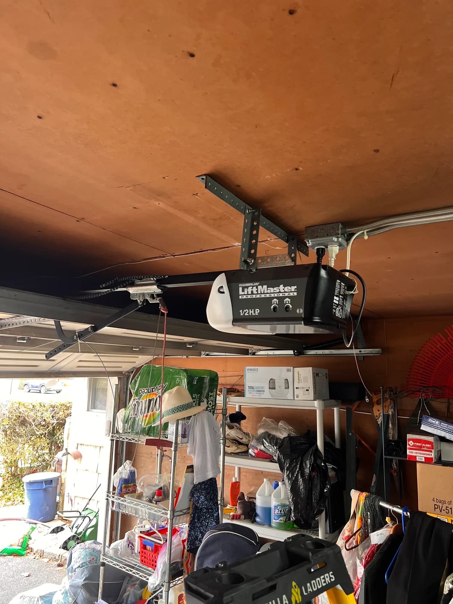 LiftMaster garage door opener on a residential ceiling