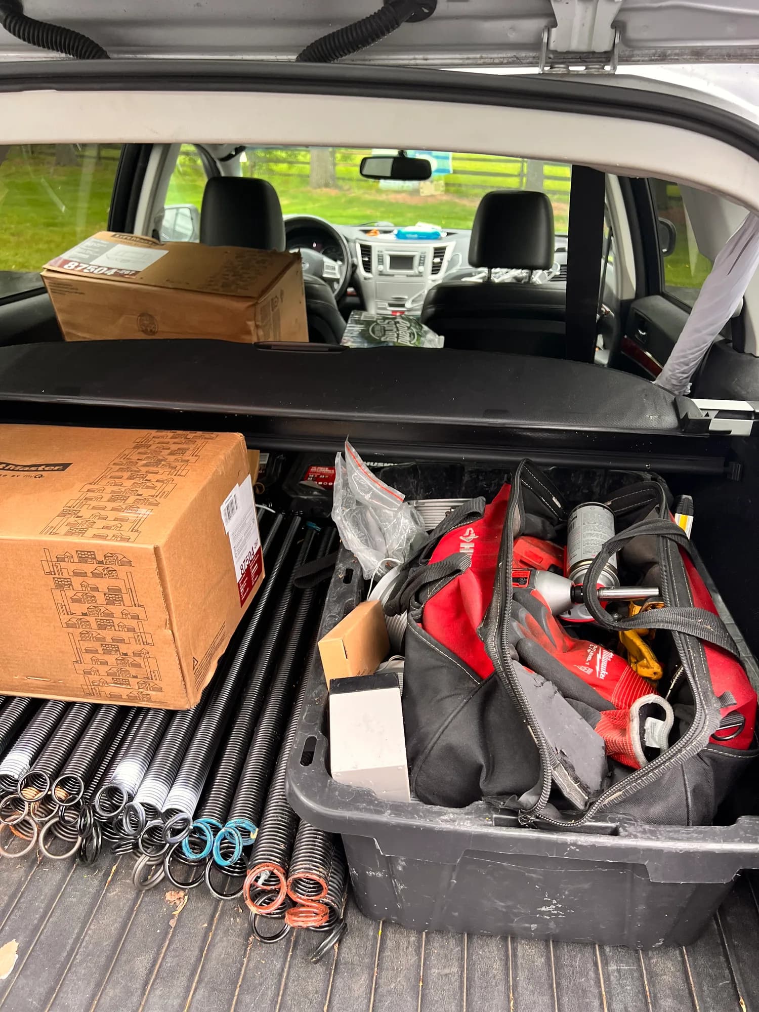 Garage door tools in a WeDo service vehicle