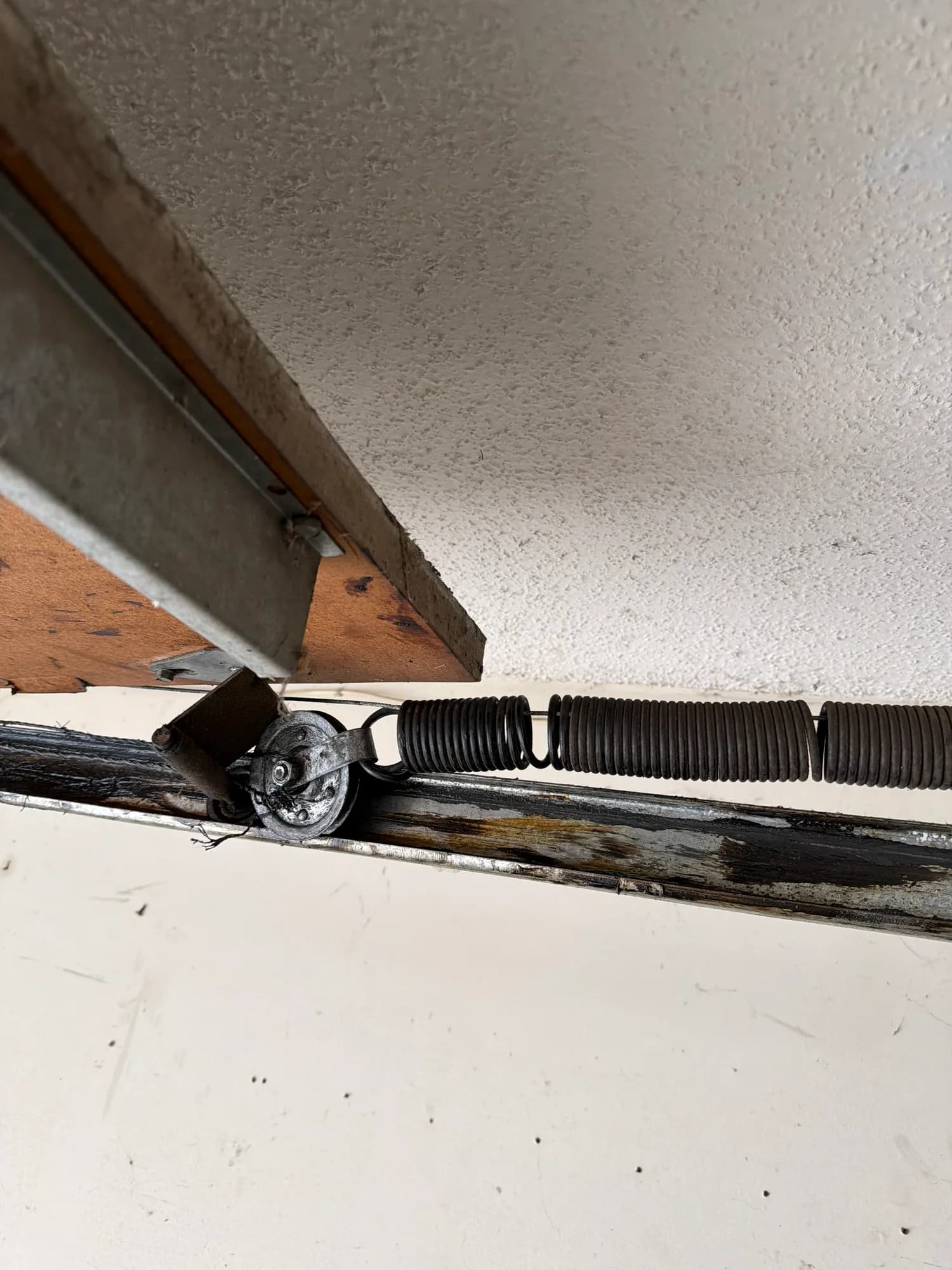 Broken torsion spring on a residential door
